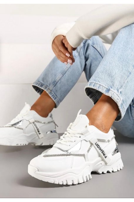 White lace-up sneakers with chunky soles